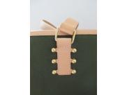 The sewn piece with round-headed screws